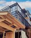 Rückansicht des Wohnbauprojekts Fujian, vernagelt mit LIGNOLOC® Holznägeln von BECK